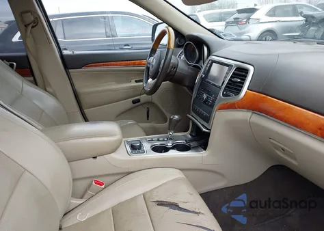 2011 Jeep Grand Cherokee Overland z USA, uszkodzony, nr VIN 1J4RR6GT7BC560447